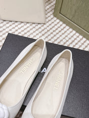 CHANEL 25S BALLET FLAT ROUND TOE IN WHITE AND BLACK SHEEPSKIN WITH CAMELLIA