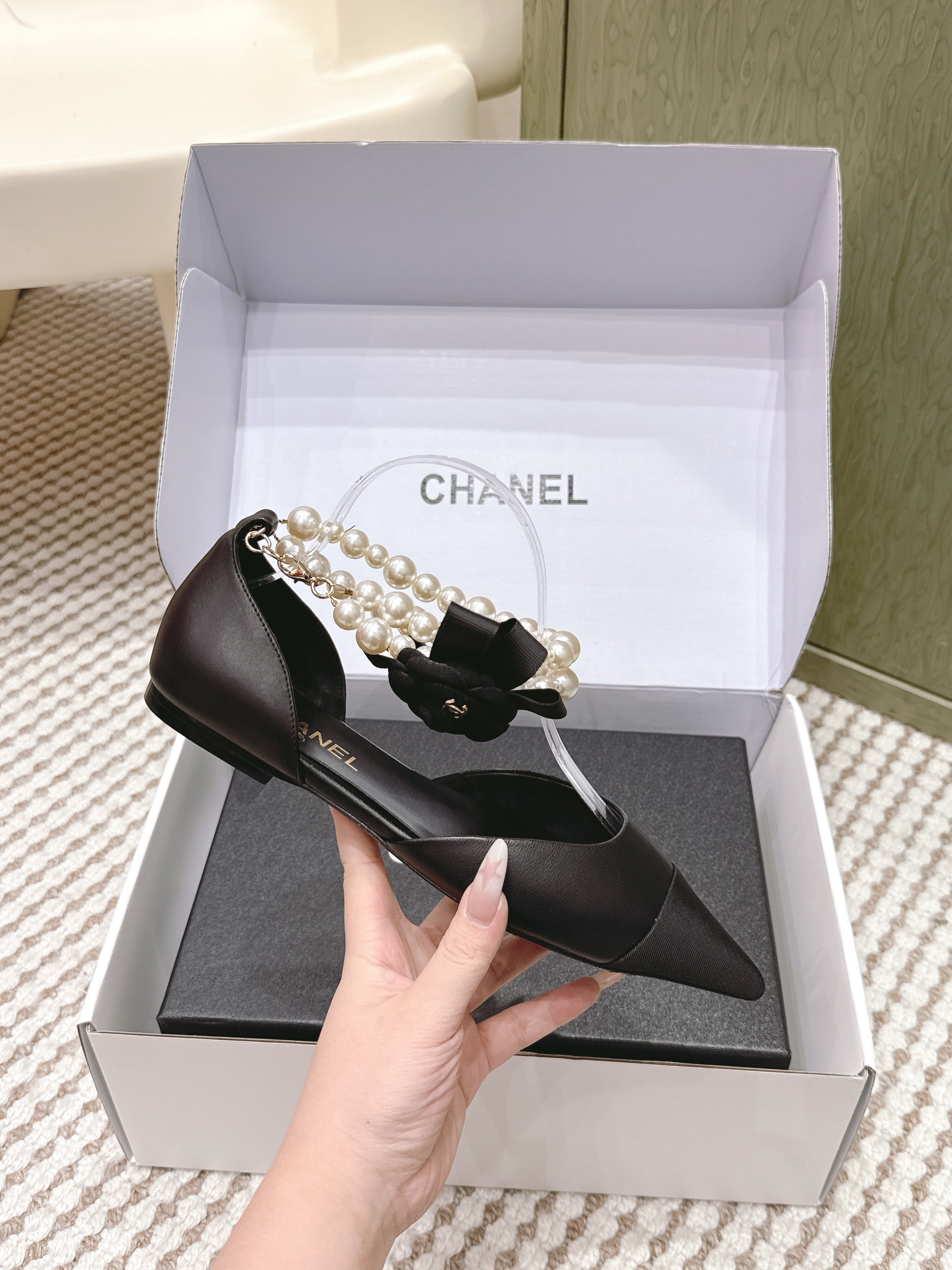 CHANEL 25S ESPADRILLE FLATS IN BLACK CALFSKIN WITH PEARL STRAP