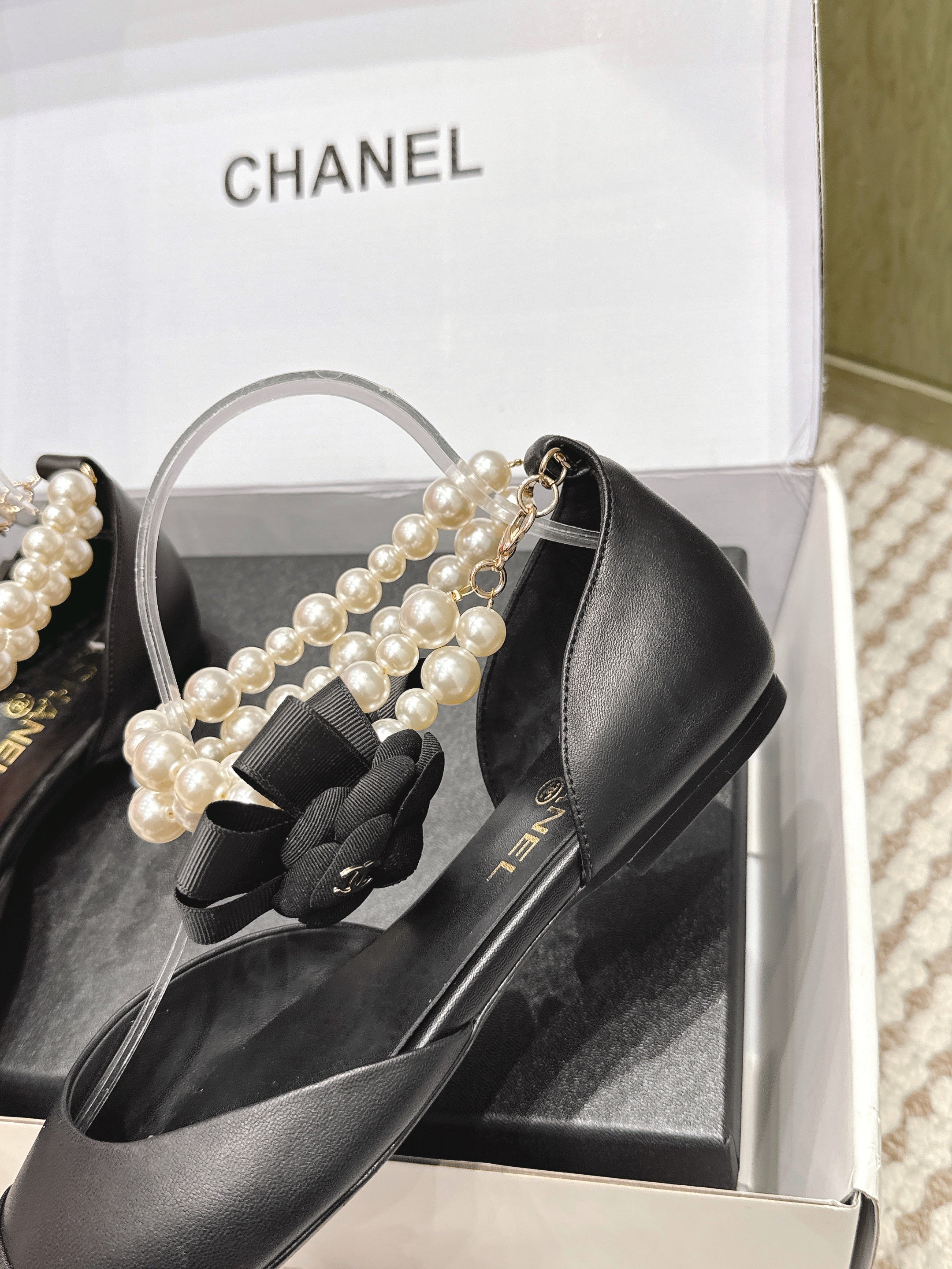 CHANEL 25S ESPADRILLE FLATS IN BLACK CALFSKIN WITH PEARL STRAP