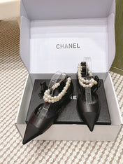 CHANEL 25S ESPADRILLE FLATS IN BLACK CALFSKIN WITH PEARL STRAP