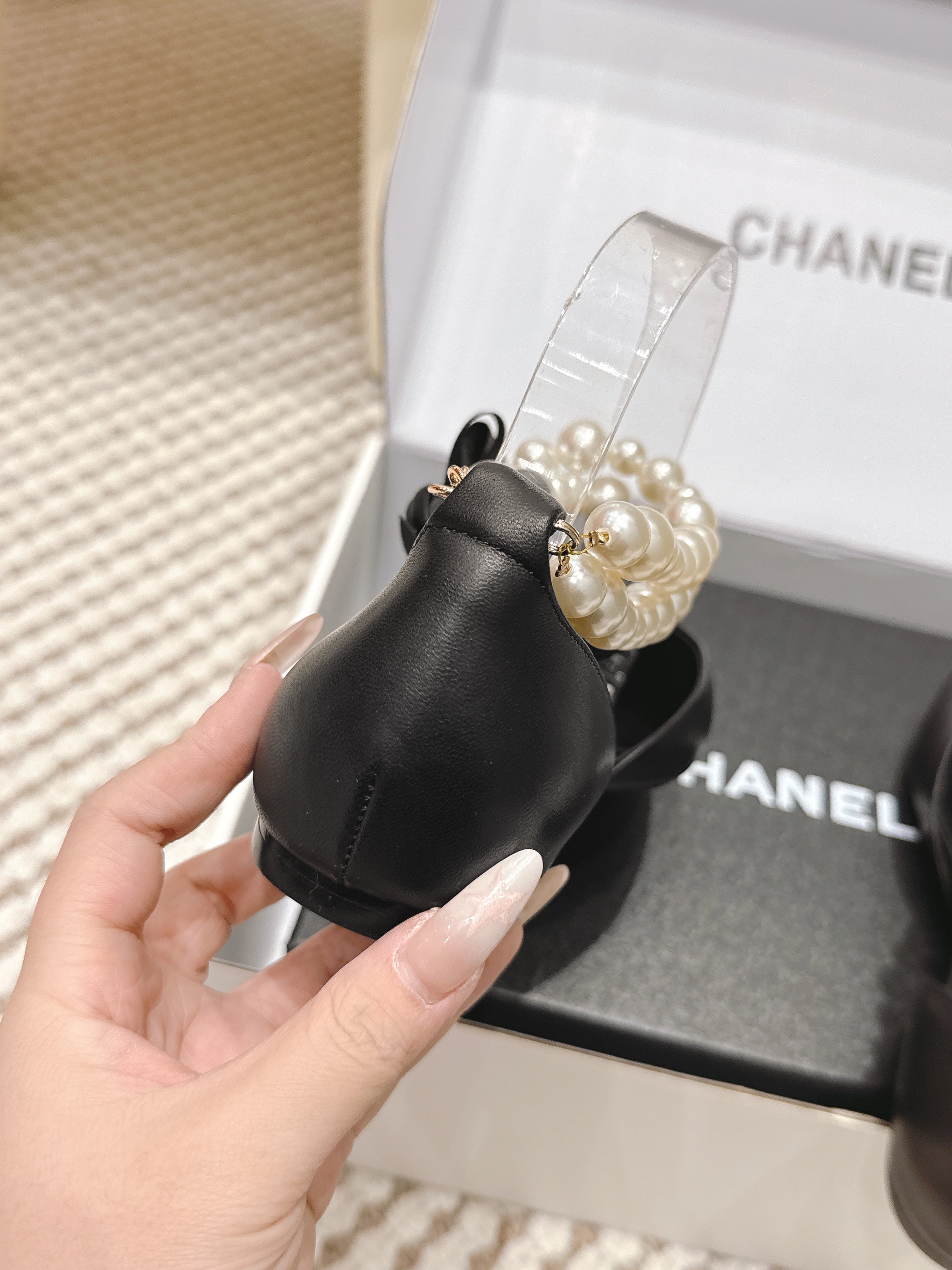 CHANEL 25S ESPADRILLE FLATS IN BLACK CALFSKIN WITH PEARL STRAP