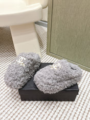 CHANEL 25S CLASSIC FURRY SLIDES IN GRAY WITH DOUBLE C LOGO
