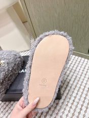 CHANEL 25S CLASSIC FURRY SLIDES IN GRAY WITH DOUBLE C LOGO