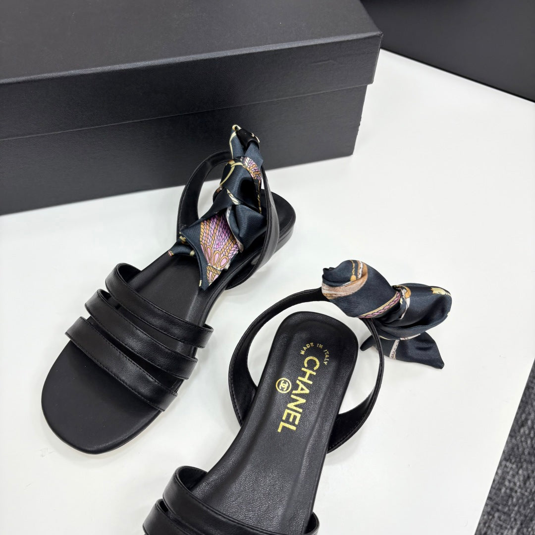 CC SANDAL 25S IN BLACK LAMBSKIN WITH SILK BOW