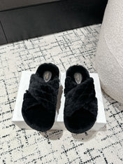 CROSS STRAP SLIPPER IN BLACK SHEARLING