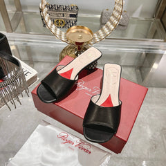 CRYSTAL HEEL MULE IN BLACK CALFSKIN