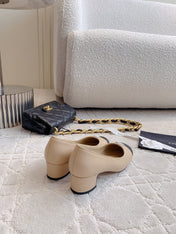 PUMP ROUNG TOE IN BEIGE CREAM MIX BLACK SHEEPSKIN