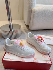 VIV' SKATE WHITE LEATHER SNEAKERS WITH PINK LACES AND CARTOON CHARMS