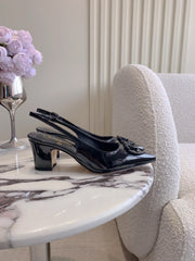 HIGH SLINGBACKS 65 MM IN BLACK PATENT CALFSKIN