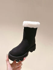 ANKLE BOOTS IN BLACK EMBOSSED CALFSKIN AND WHITE SHEARLING