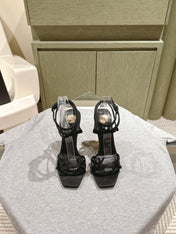 YSL 25S HIGH-HEEL SANDALS 100 MM IN BLACK SATIN WITH YSL LOGO HEEL DESIGN IN GOLD