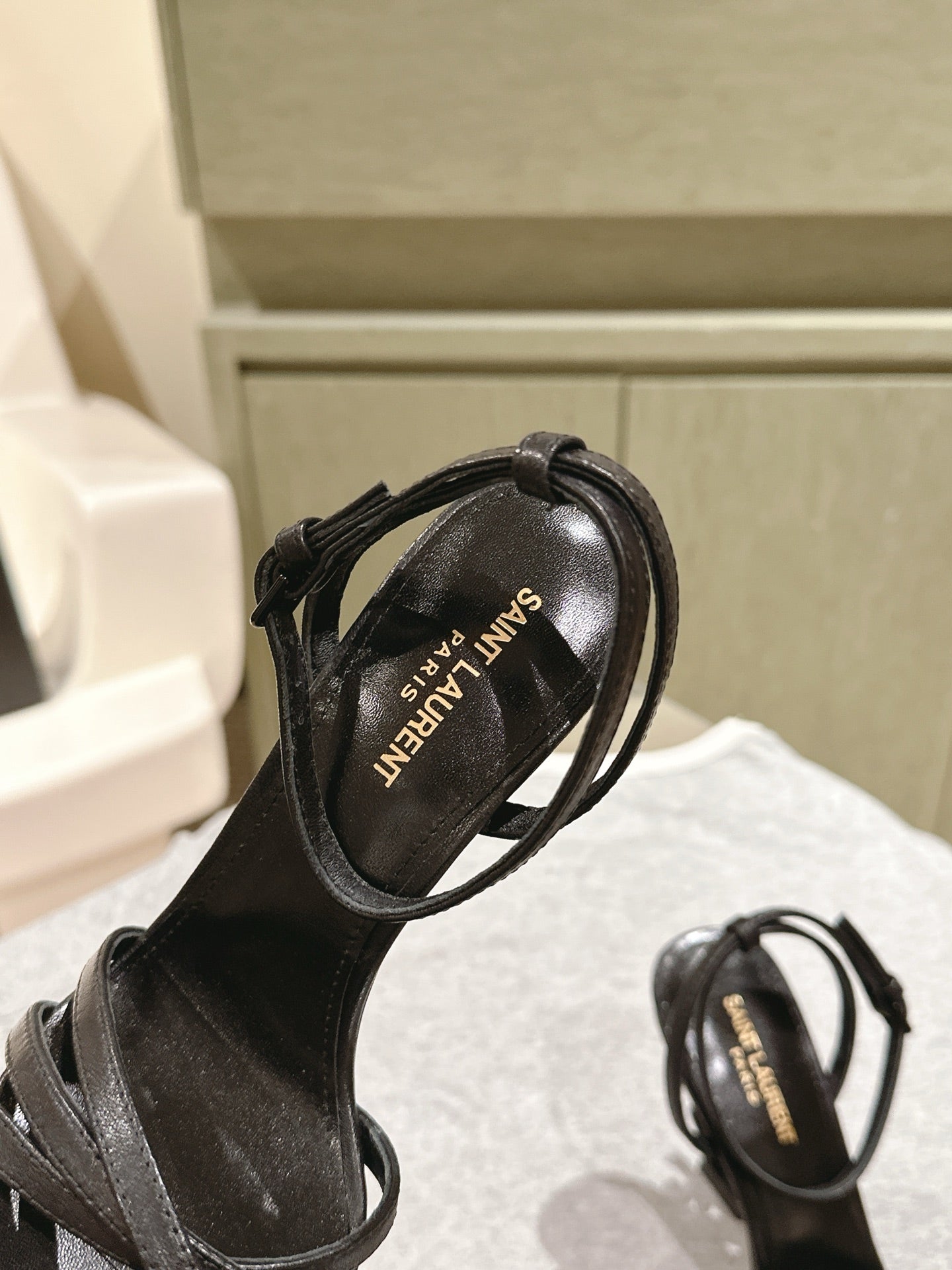 YSL 25S HIGH-HEEL SANDALS 100 MM IN BLACK LAMBSKIN WITH YSL LOGO HEEL DESIGN