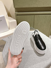 THICK-SOLED ELASTIC BACKLESS SHOES BLACK SHINY CALFSKIN