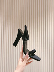 YSL 25S HIGH-HEEL SANDALS 100 MM IN BLACK SATIN