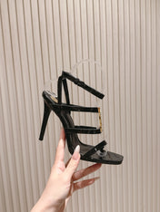 YSL 25S STILETTO HIGH-HEEL SANDALS 100 MM IN BLACK LAMBSKIN WITH GOLD HARDWARE