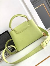 CAPUCINES BB 27 IN PEAR GREEN TAURILLON GOLD HARDWARE