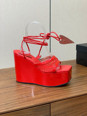 ALAIA BANQUET WEDGE SANDALS IN CHERRY RED LAMBSKIN WITH RED HEART
