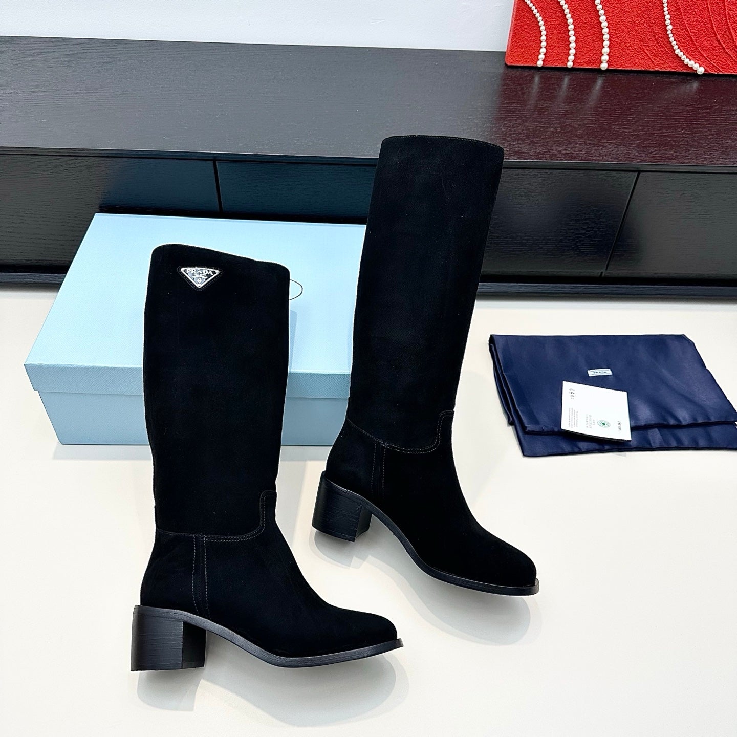 PRADA 25S HIGH-CUT BOOTS 55 MM IN BLACK SUEDE