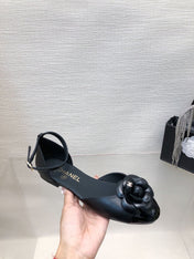 BLACK LAMBSKIN CAMELLIA HOLLOW SANDAL