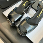 HIGH HEEL PLATFORM SANDALS IN BLACK CALFSKIN