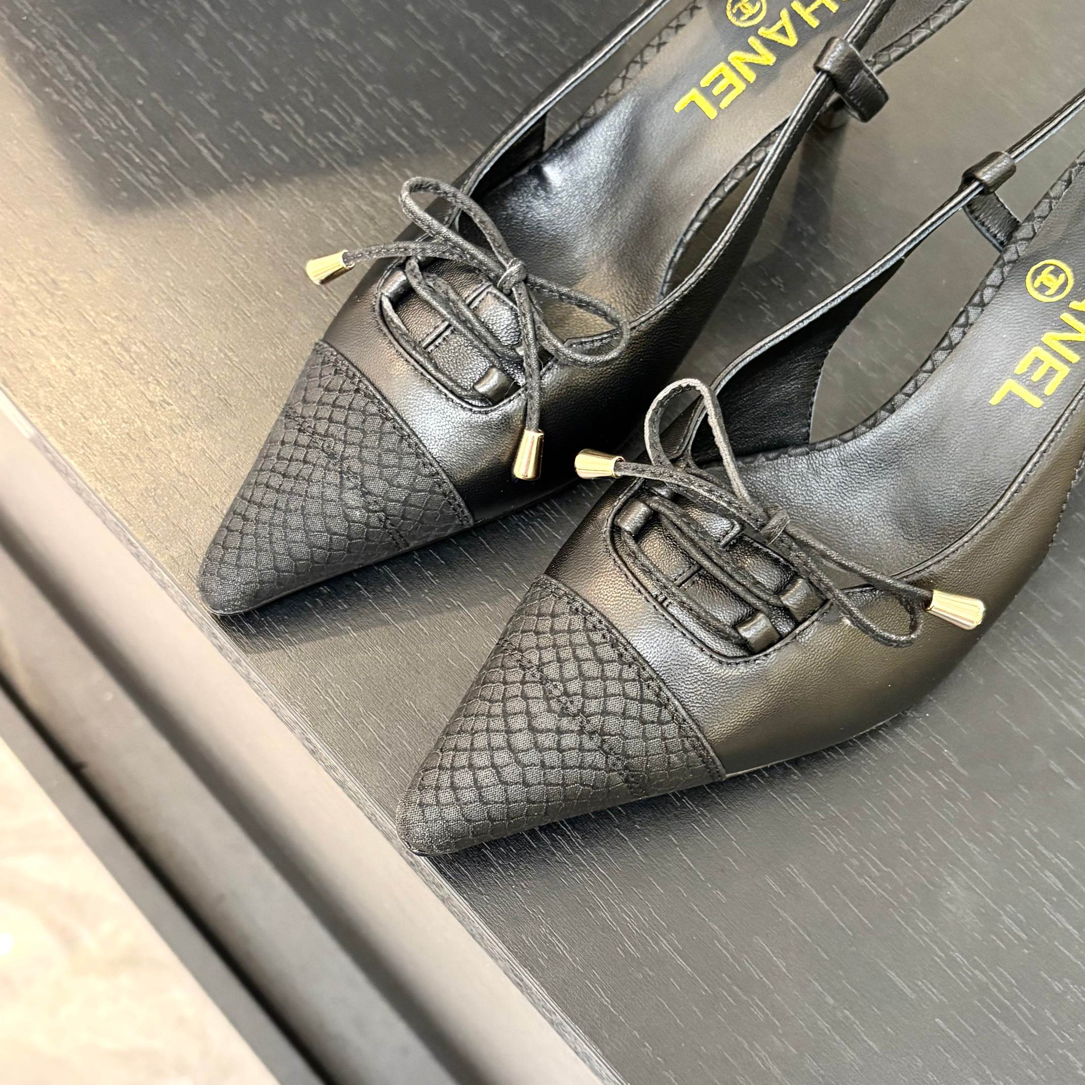 HIGH HEEL SLINGBACKS 65 MM IN BLACK WITH SNAKESKIN PATTERN LAMBSKIN