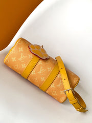 KEEPALL BANDOULIÈRE 25 IN ORANGE MONOGRAM HERITAGE CANVAS