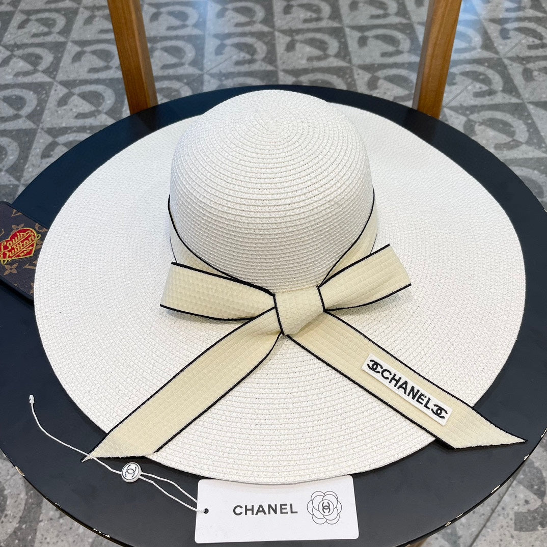 WIDE BRIM STRAW HAT WITH BOW WHITE 672704