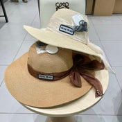 MM WIDE-BRIM BEACH HAT IN LIGHT BEIGE WITH FABRIC BOW