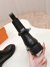 KELLY BUCKLE SHORT BOOTS IN BLACK CALFSKIN