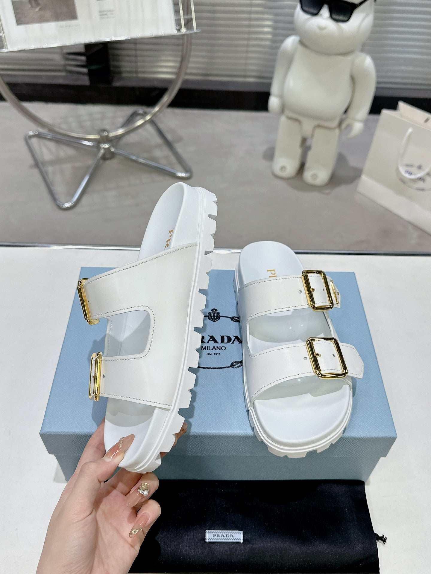 PRADA 25S STRAP SLIDES 30MM IN WHITE CALFSKIN GOLD HARDWARE