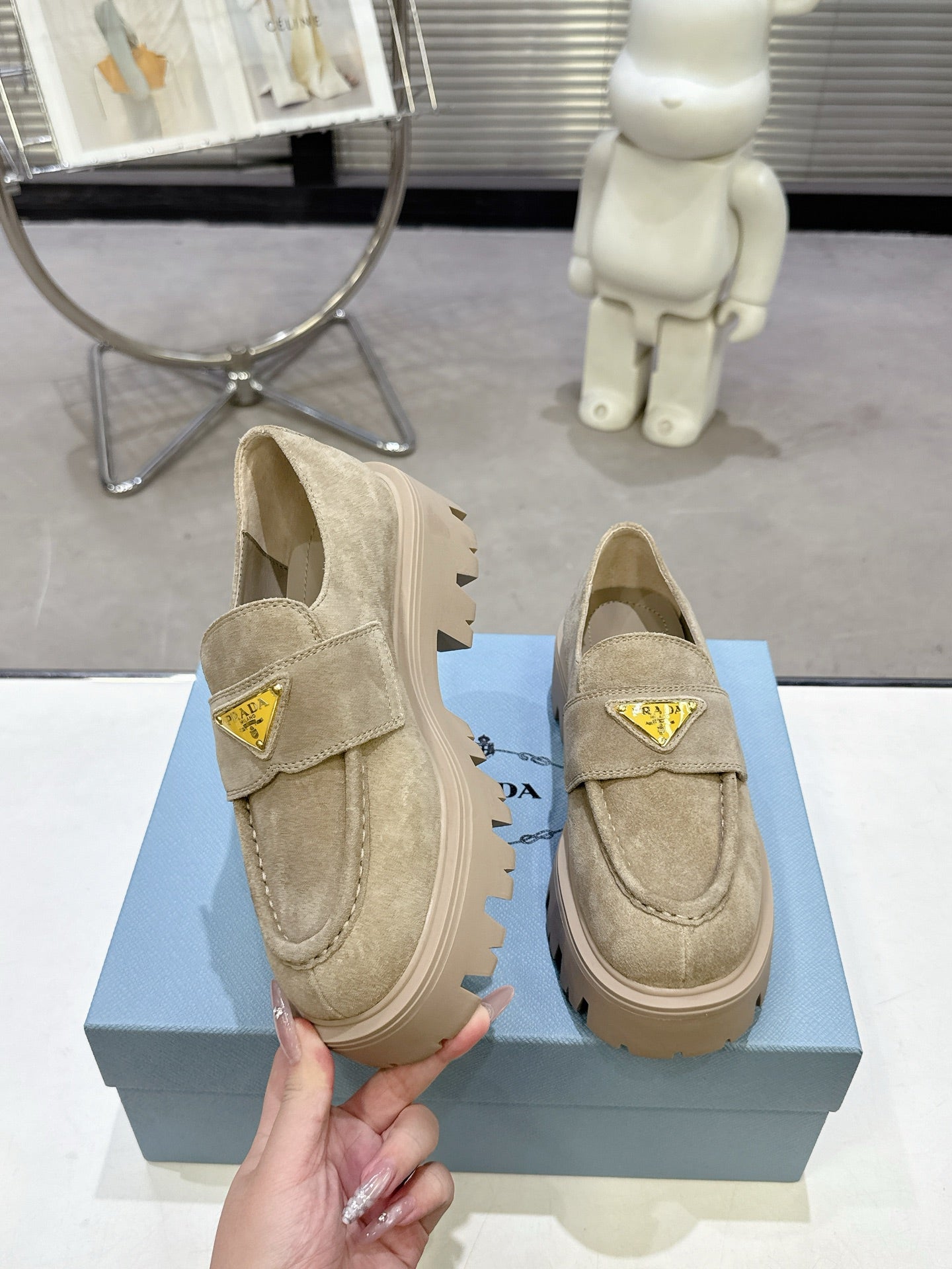 PRADA 25S THICK-SOLE LOAFERS 60 MM IN BEIGE SUEDE WITH GOLD HARDWARE