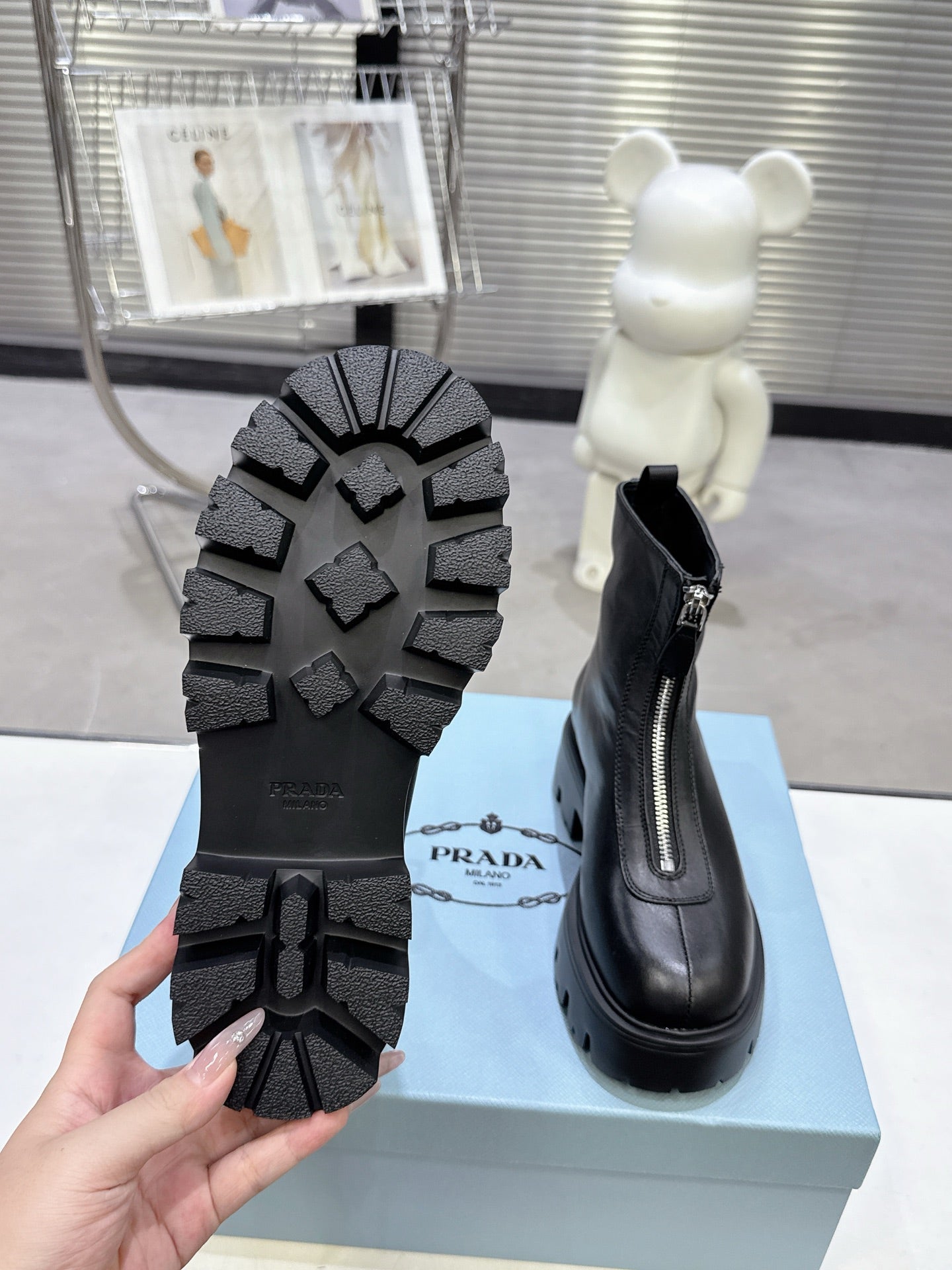 PRADA 25S ZIP-UP ANKLE BOOTS IN BLACK CALFSKIN