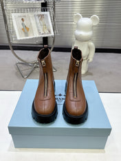 PRADA 25S ZIP-UP ANKLE BOOTS IN BROWN CALFSKIN