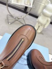 PRADA 25S ZIP-UP ANKLE BOOTS IN BROWN CALFSKIN