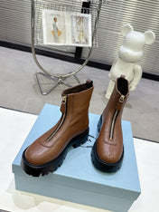 PRADA 25S ZIP-UP ANKLE BOOTS IN BROWN CALFSKIN