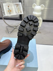 PRADA 25S ZIP-UP ANKLE BOOTS IN BROWN CALFSKIN