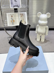PRADA 25S RETRO PLATFORM MARTIN ANKLE BOOTS IN BLACK CALFSKIN