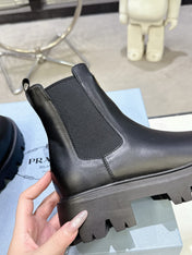 PRADA 25S RETRO PLATFORM MARTIN ANKLE BOOTS IN BLACK CALFSKIN