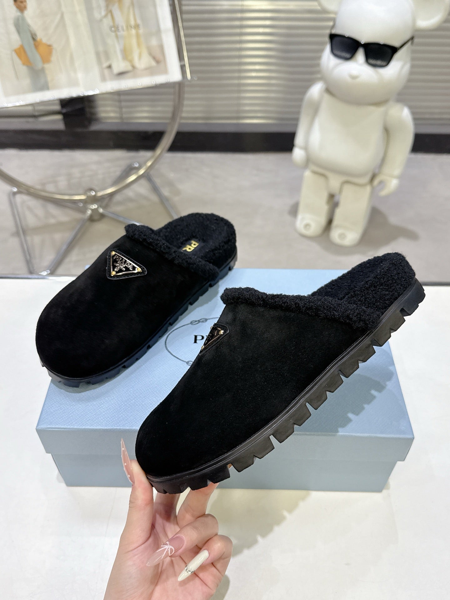 PRADA 25S FUR-LINED SABOT MULES IN BLACK SUEDE