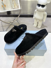PRADA 25S FUR-LINED SABOT MULES IN BLACK SUEDE
