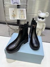 PRADA 25S RETRO PLATFORM MARTIN BOOTS IN BLACK CALFSKIN