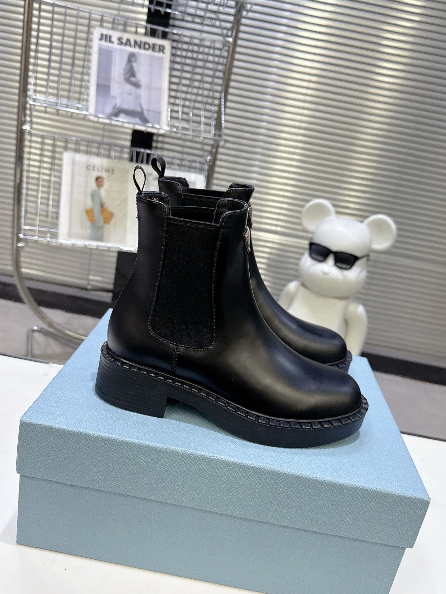 PRADA 25S RETRO PLATFORM MARTIN BOOTS IN BLACK CALFSKIN
