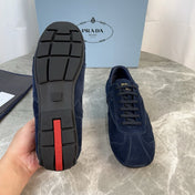 PRADA 25S MONTECARLO ANTIQUED SNEAKERS IN NAVY BLUE SUEDE