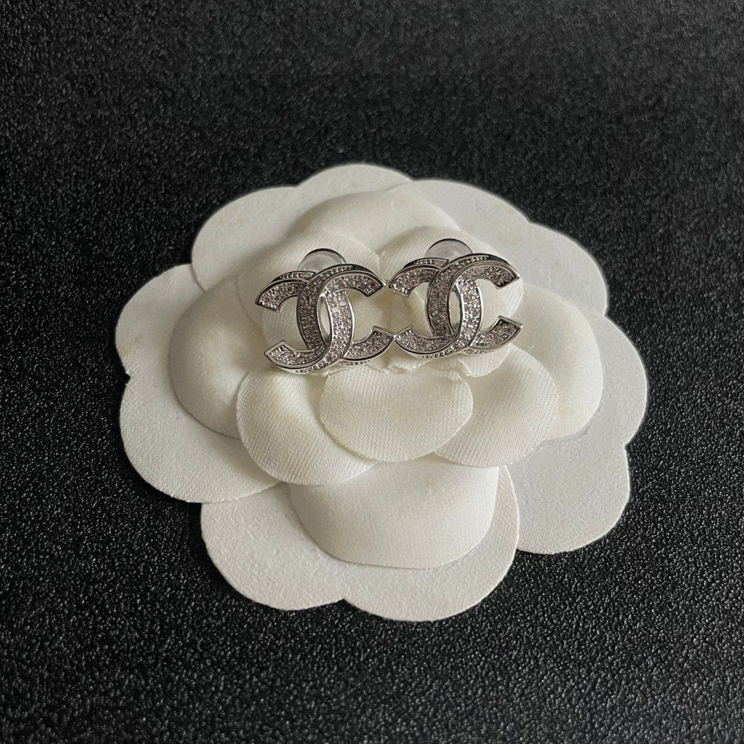 DOUBLE C STUD EARRINGS IN SILVER METAL FULLY DIAMOND