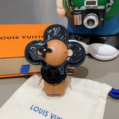 LV KEYCHAIN IN BLACK CALFSKIN AND WOOD