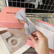 SILK BOW HEADBAND LANGUID LAVENDER 159004