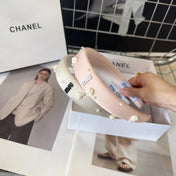 HEADBAND EMBELLISHED FLOWER AND PEARL IN LIGHT PINK SILK 194315