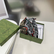 BOW HAIRBAND IN DARK BEIGE MONOGRAM CANVAS 414472