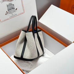 GARDEN PARTY 30CM IN WHITE TOILETS COTTON CANVAS AND BLACK CALFSKIN BLUE CANVAS ON SIDE OTHER