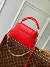 CAPUCINES MINI 23 IN RED TAURILLON GOLD HARDWARE
